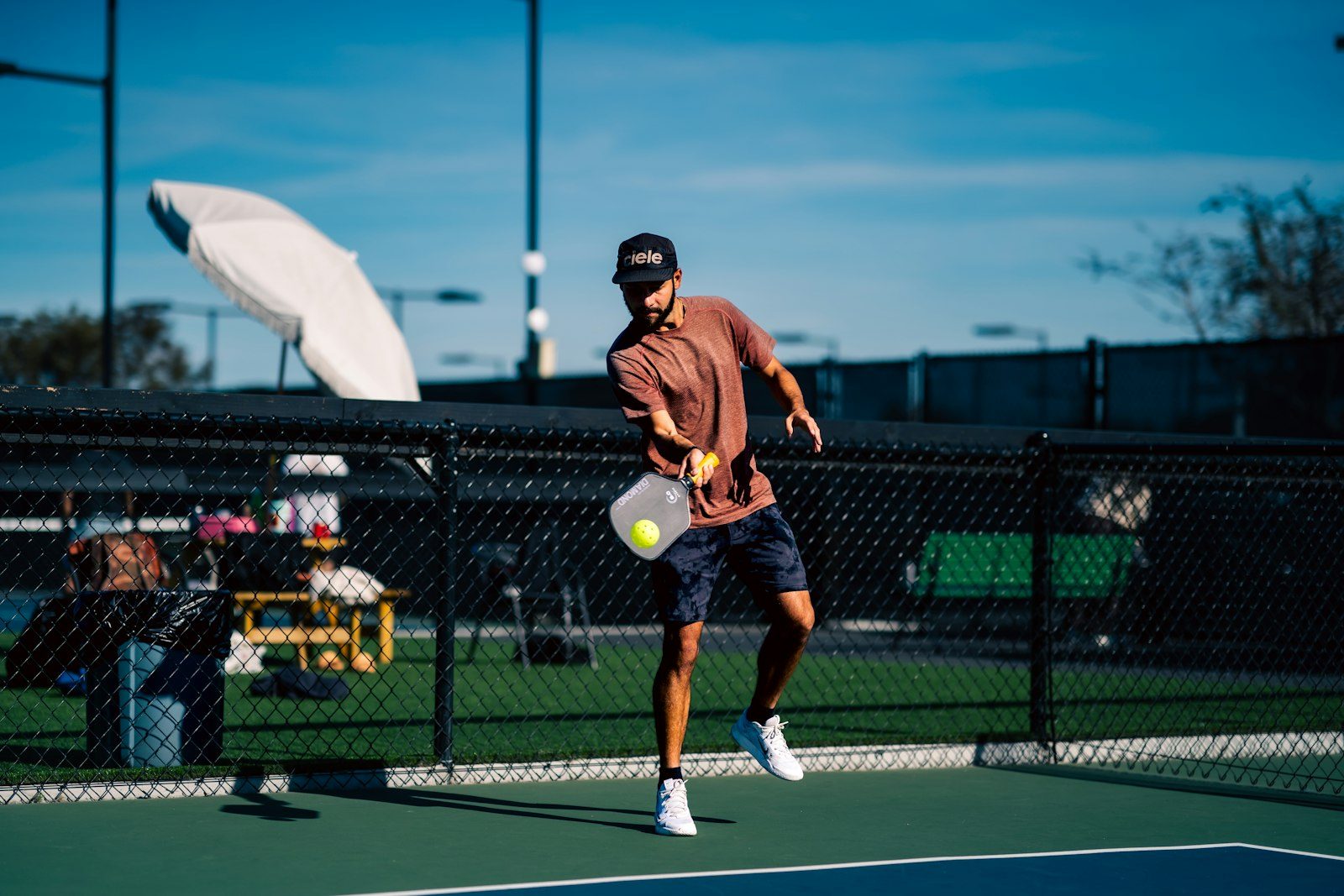 A player follows through on a shot during a match